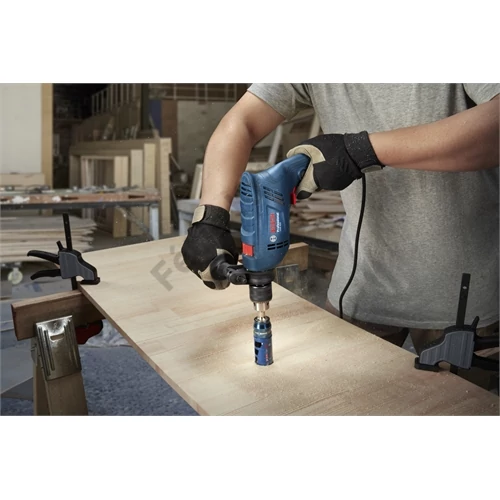 Bosch GSB 600 ütvefúrógép 600W +100 részes tartozék készlet